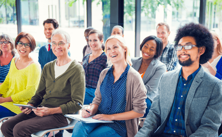 Group of people sitting together at a class