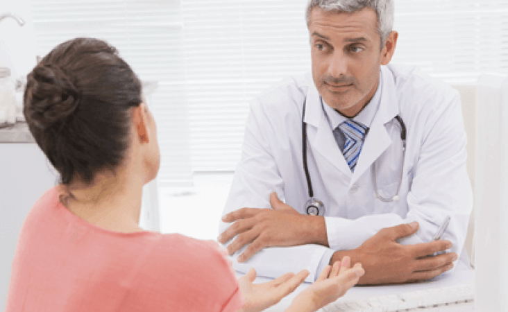 Patient speaking with doctor