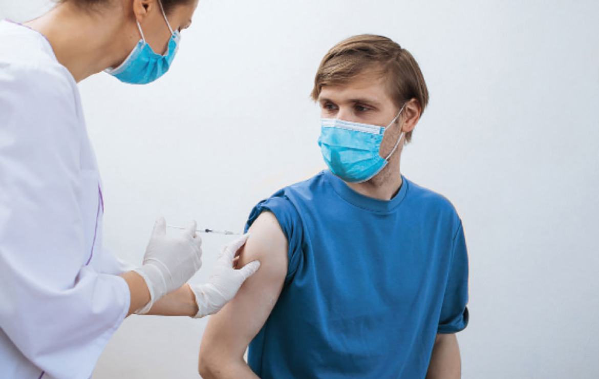 https://www.sharphealthplan.com/images/default-source/site-images/hero-images/masked-patient-getting-vaccinated-by-masked-nurse-1170x740.jpg?sfvrsn=ed9ba380_3